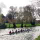 Ely women's eight racing on the Cam