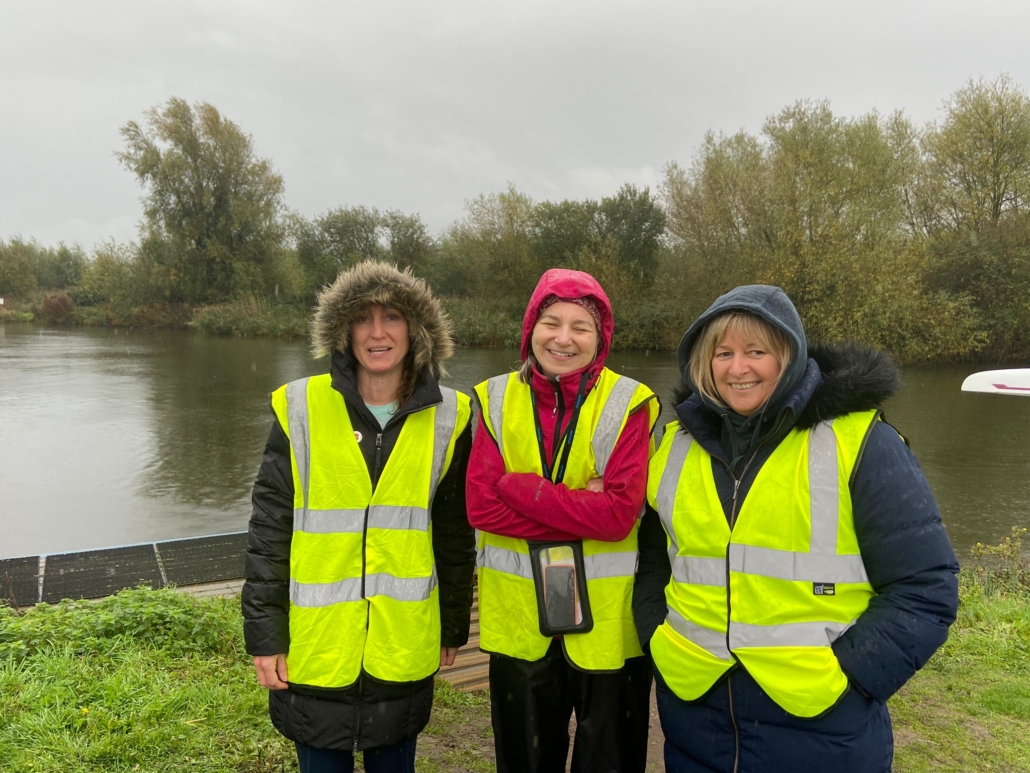 Smiling volunteers at Ely Head Race