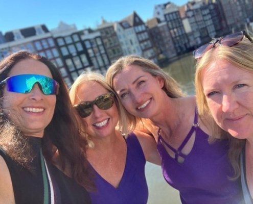 Four smiling rowers in Holland