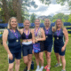 Five ladies with medals from winning rowing event